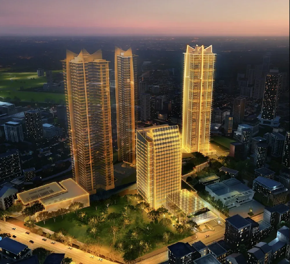 IPI Center at dusk, Rockwell Land's Cebu development with Lincoln among its towers — artist's rendering