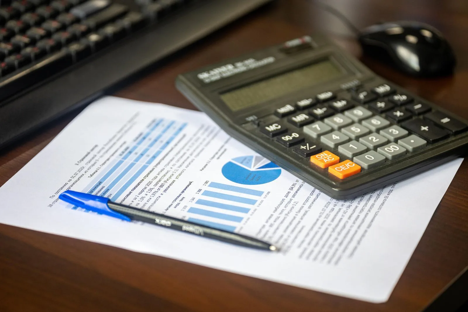 Calculator and financial computation on a desk